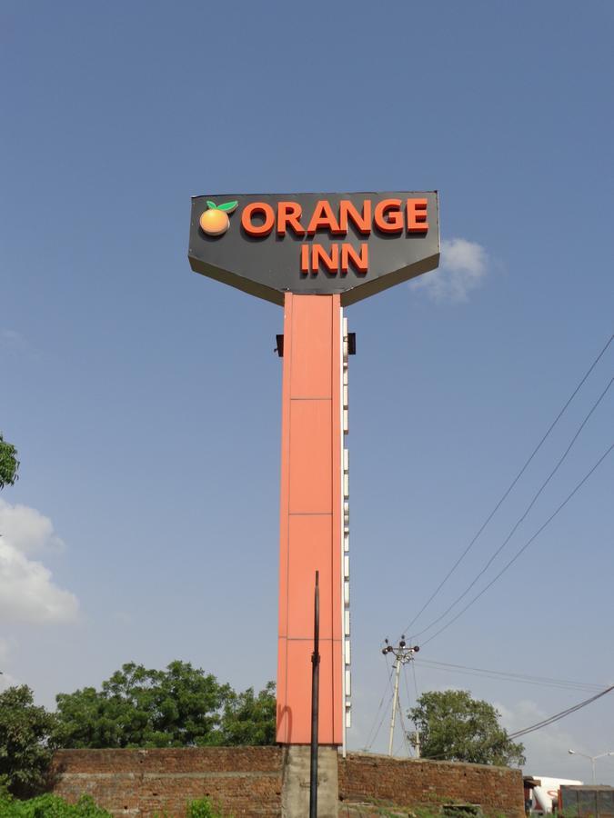 Hotel Orange Inn Sarkhej Bagian luar foto