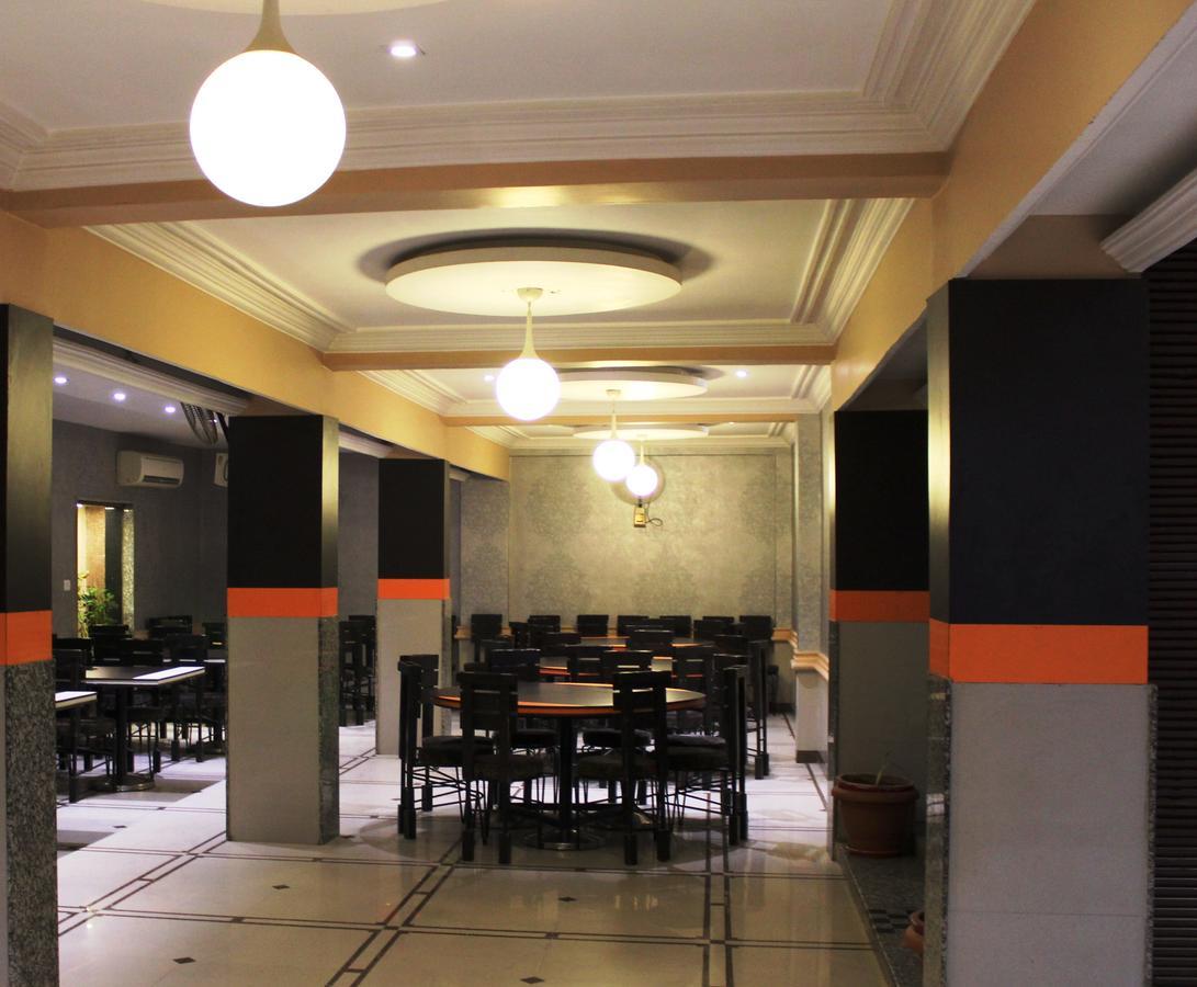 Hotel Orange Inn Sarkhej Bagian luar foto