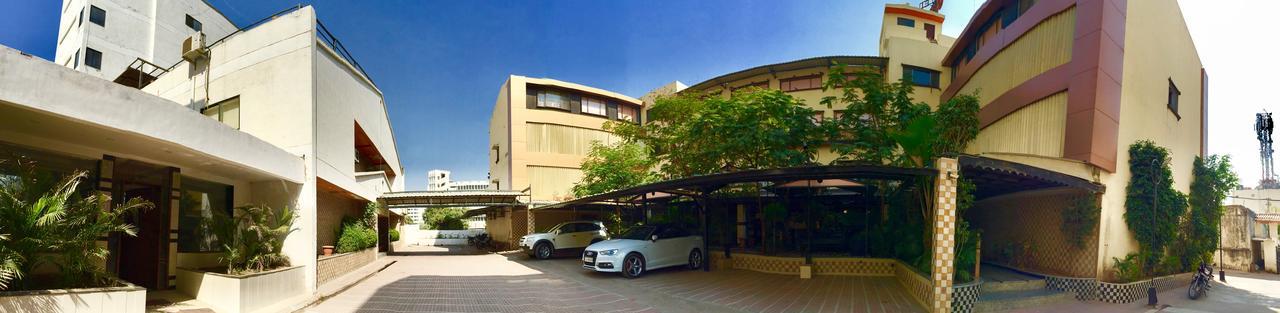 Hotel Orange Inn Sarkhej Bagian luar foto